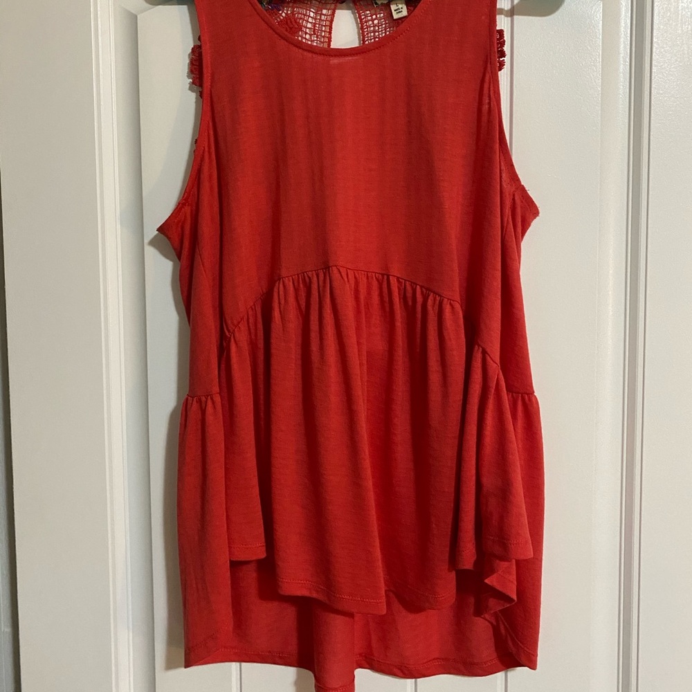 Love this shirt!! Beautiful lace back. size L